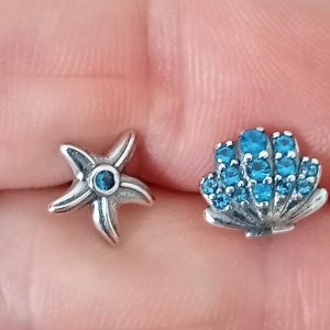 Pendientes estrella y conchas