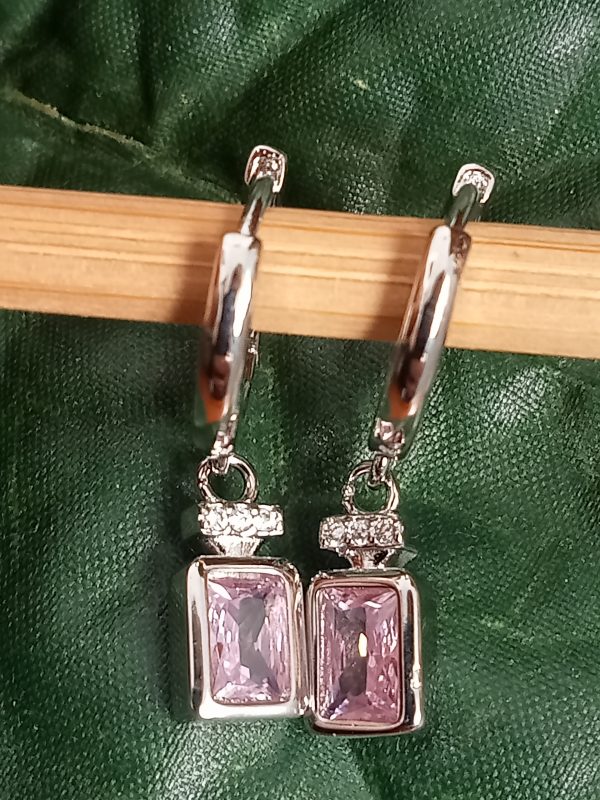 Pendientes con forma de perfume en plata
