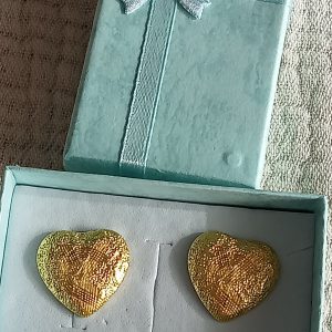 Pendientes de lujo dorados YSL