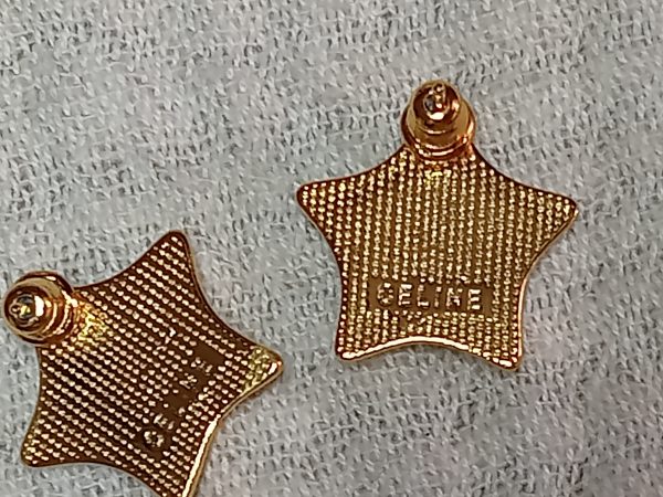 Pendientes estrella dorada y blanca Celine - Imagen 2