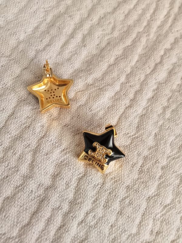Pendientes negros y dorados estrella Celine - Imagen 2