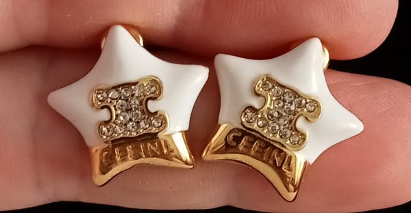 Pendientes estrella dorada y blanca Celine